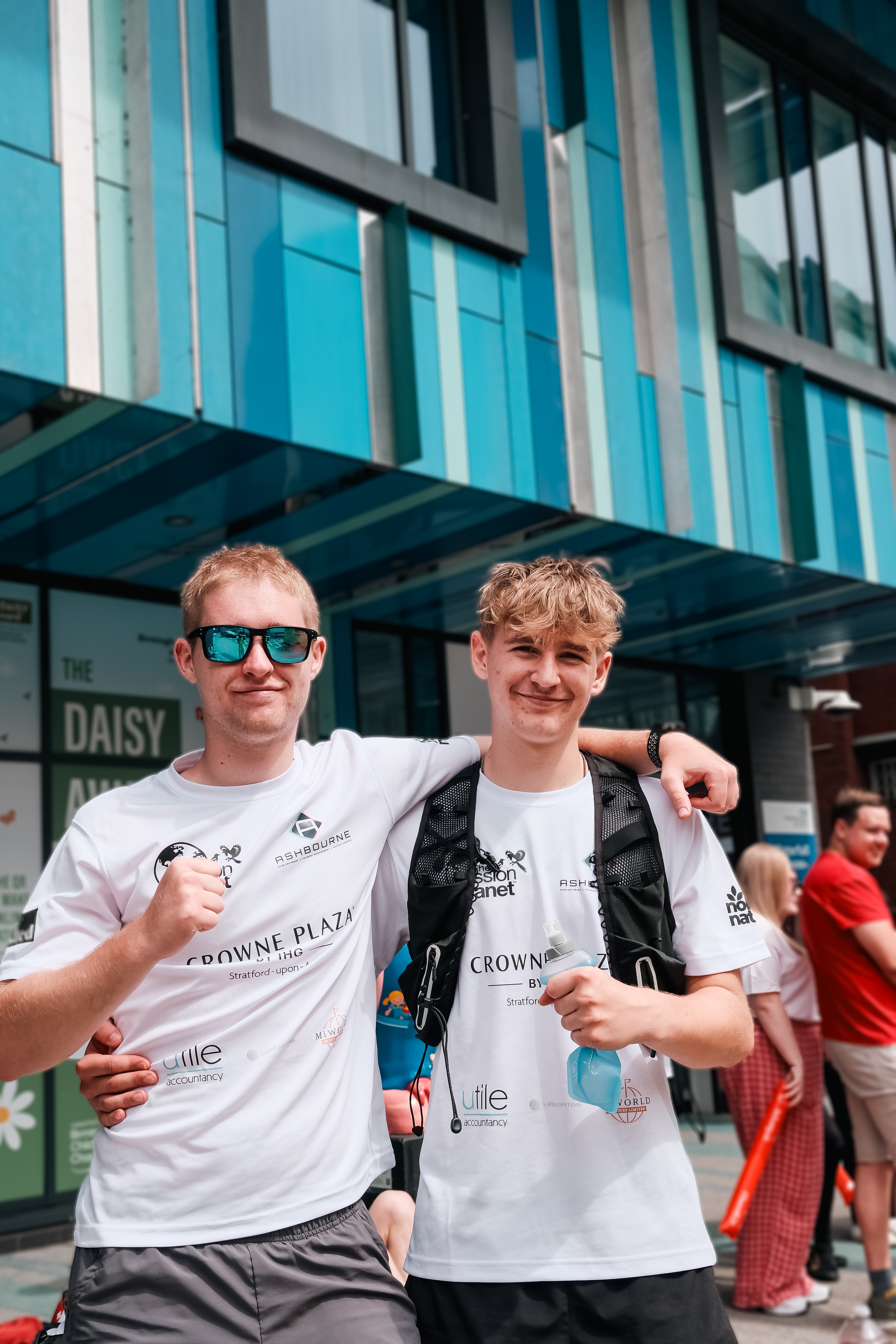 Two runners outside the hospital
